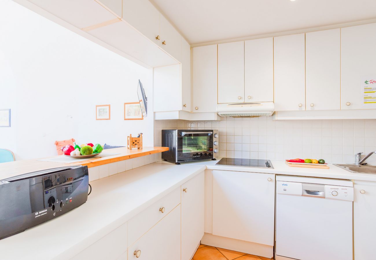 Kitchen opening onto the living room