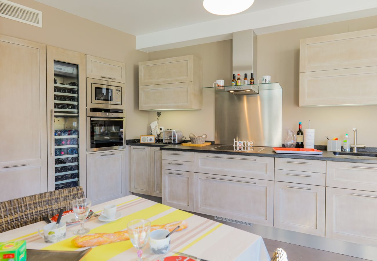 THE DINING ROOM WITH KITCHEN VIEW