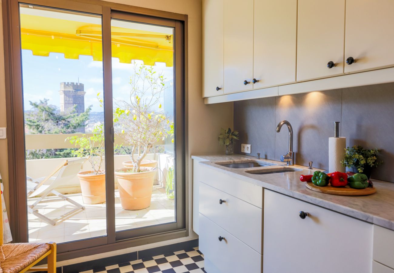 KITCHEN WITH BALCONY