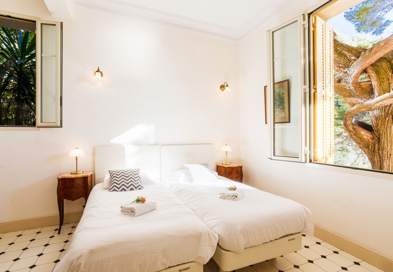 Another view of the bedroom with greenery and sea view