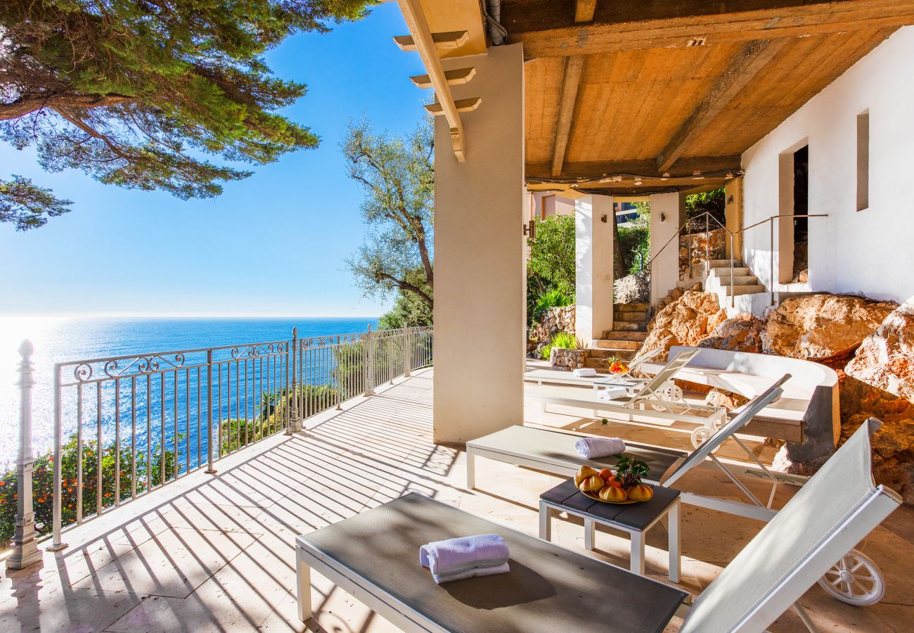 Sunny terrace with sunbed