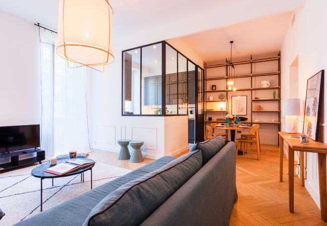 The living room with dining area and kitchen