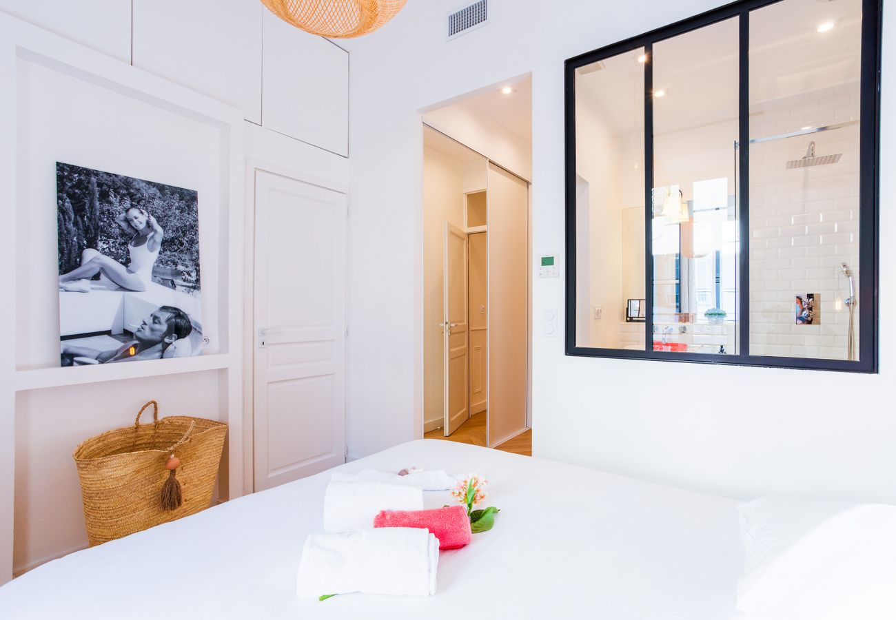 Bedroom with bathroom and closet