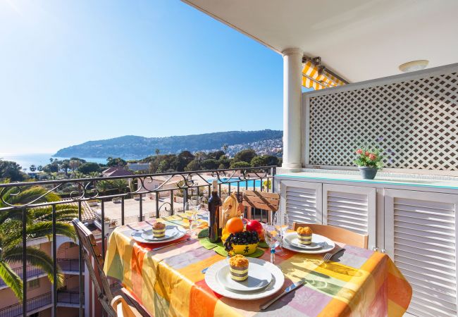 The terrace with sea and pool view