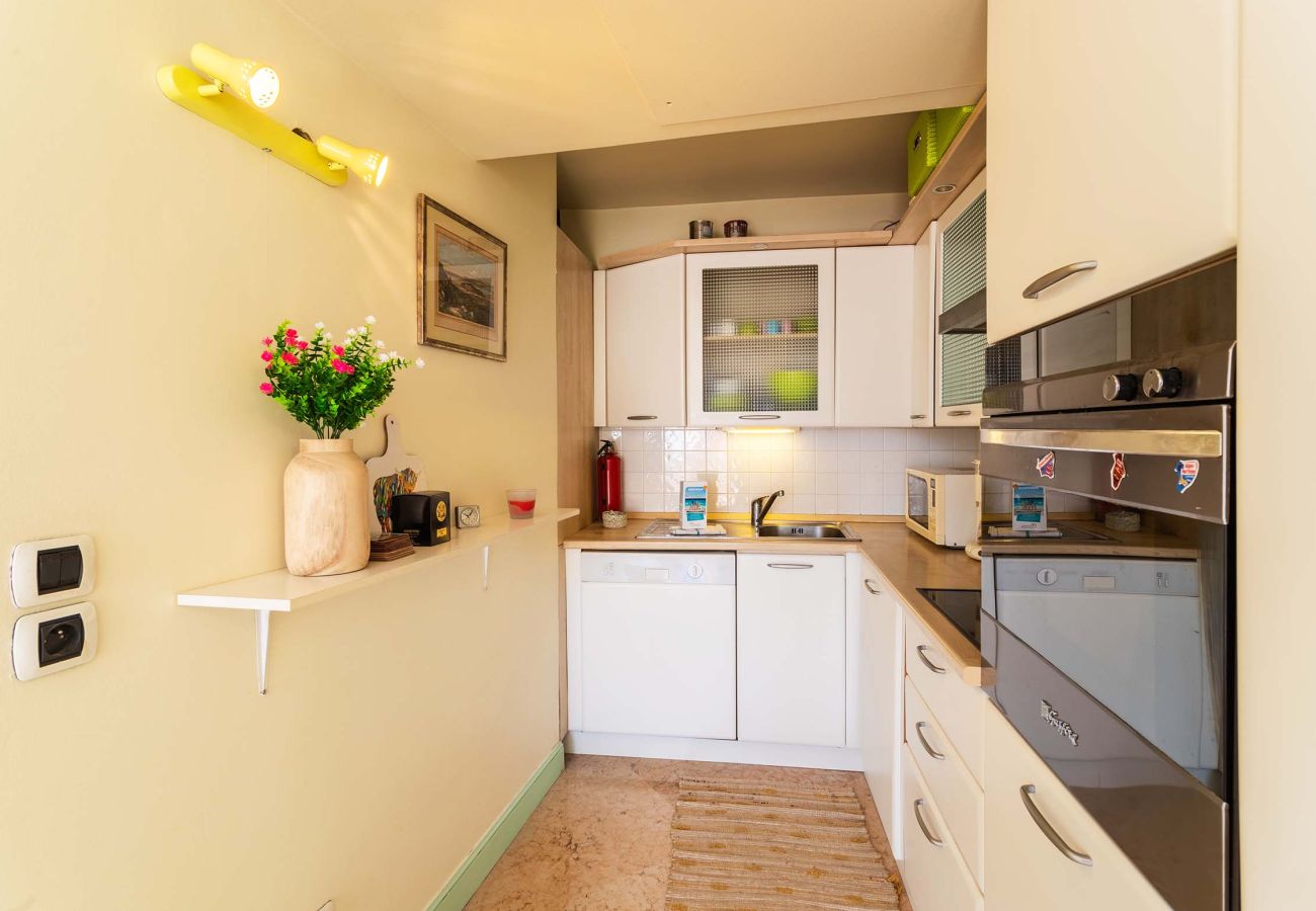 Tastefully decorated kitchen with a warm, elegant ambiance. Perfect for cooking in style and comfort.