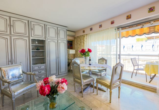 Living / Dining room overlooking the terrace Living room with dining area
